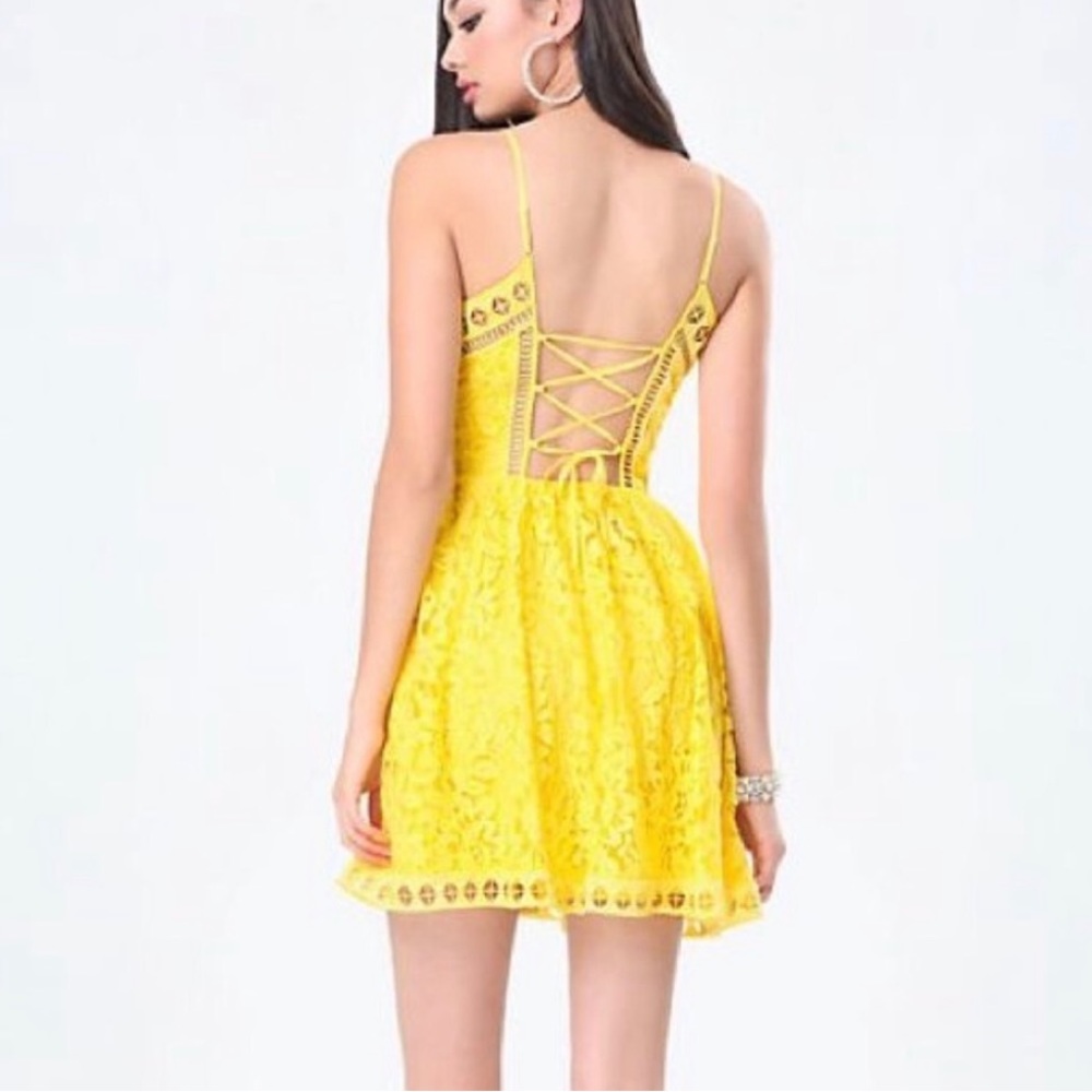 BEBE Lace Fit Flare Dress Spaghetti straps Lace-up Back Size S in bright yellow